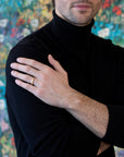 men wearing a bena jewelry chiseled collection gold ring custom made in montreal at the best jeweler boutique ruby mardi on multi color background