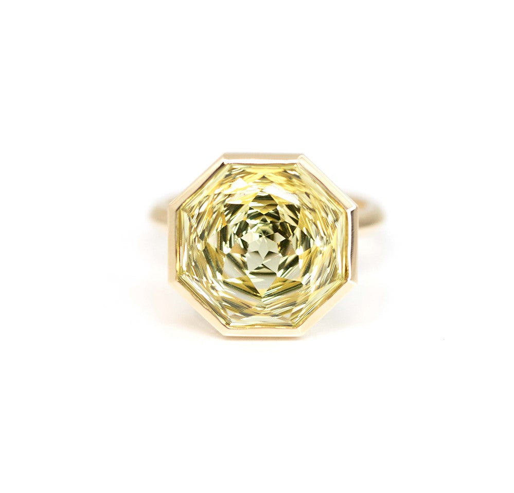 Octagonal Lemon Quartz Ring in yellow gold by Bena Jewelry featuring a bezel-set lemon quartz with a unique faceting pattern, photographed on a white background.