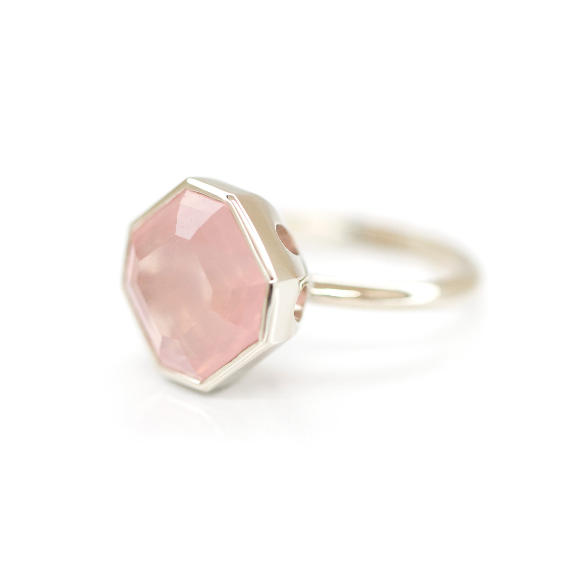 Bold white gold cocktail ring with an octagon-cut pink rose quartz, handcrafted by Bena Jewelry, displayed on a clean white background.