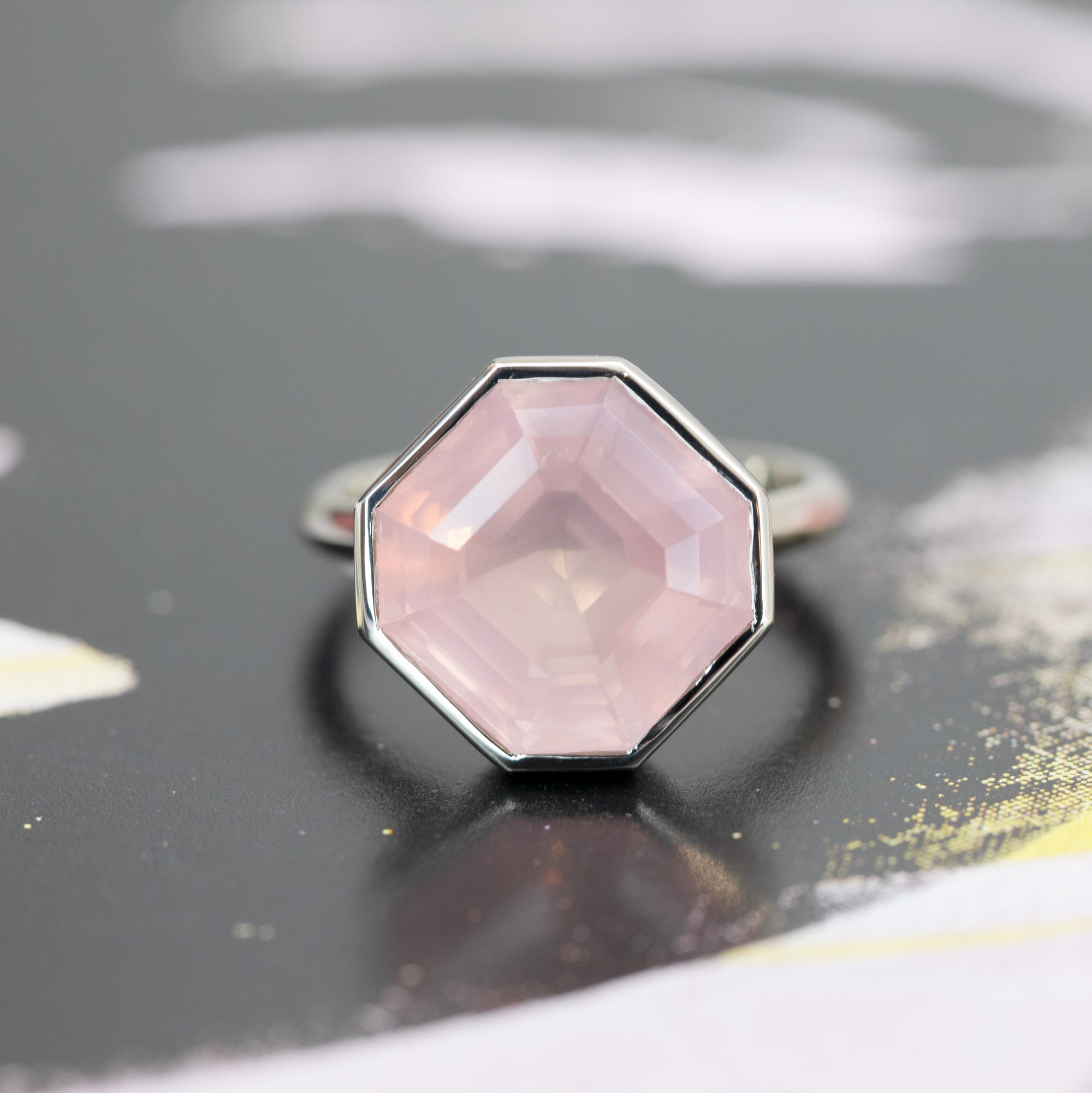 White gold Octagon Rose Quartz Ring by Bena Jewelry featuring a translucent pink rose quartz gemstone in a bezel setting, handcrafted in Montreal, Canada.