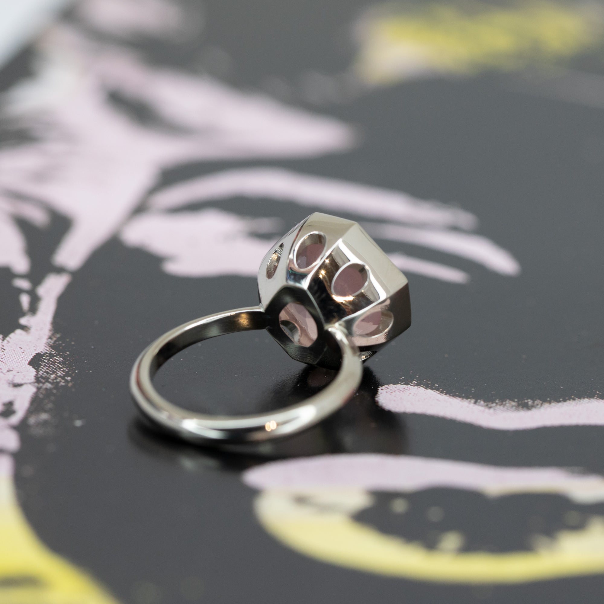 Octagon Rose Quartz Cocktail Ring in white gold by Bena Jewelry, featuring a bezel-set candy-pink gemstone, photographed from the back on a dark background, modern fine jewelry made in Montreal.