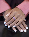 A close-up of the Avalanche Pink Sapphire Ring worn, showcasing its artistic design, vibrant gemstones, and yellow gold setting. Made by Bena Jewelry in Montreal, Canada.