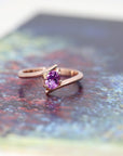 bena jewelry custom made pink sapphire minimalist engagement ring made in montreal on multi color background