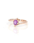 front view of oval shape pink sapphire kink ring custom made in rose gold in montreal by bena jewelry desgin white background
