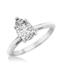 Side view of pear shape engagement ring montreal made in canada bridal jewelry pear shape icy diamond handmade in montreal bridal ring custom made diamond jewelry montreal