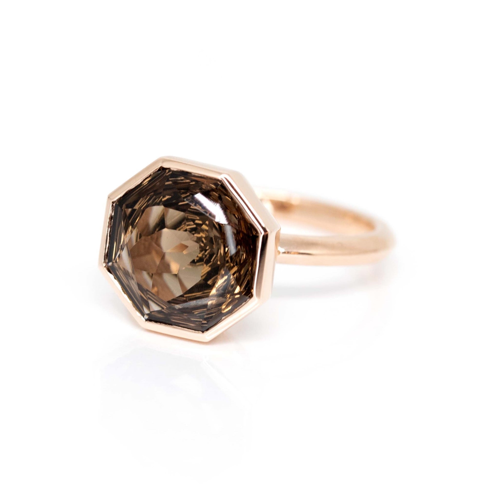 Rose gold cocktail ring featuring a Brazilian smoky quartz with a round-octagon cut, handcrafted à Montreal by Bena Jewelry, part of the Fancy Edgy collection.
