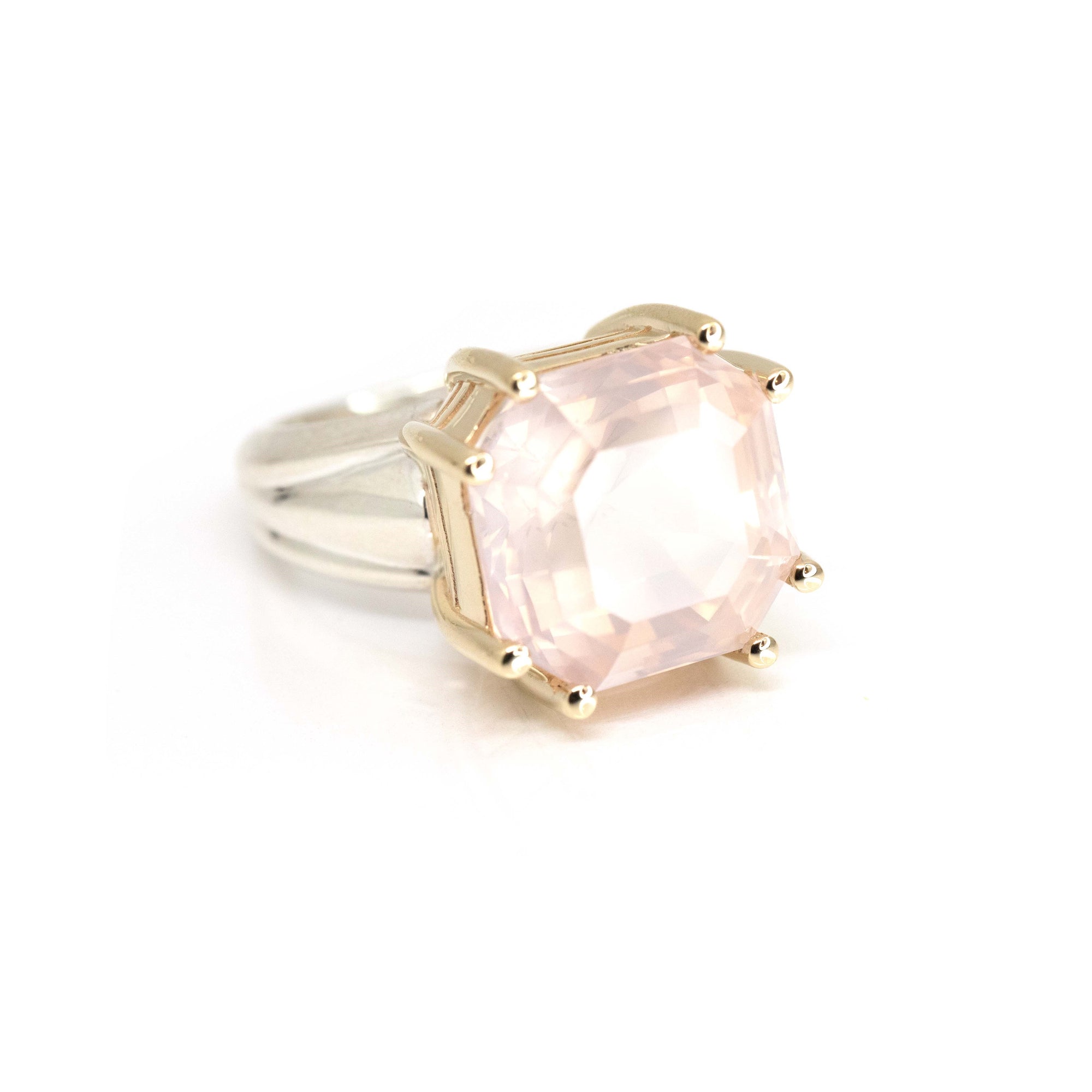 Close-up of quartz ring on white background – The soft, cloud-like appearance of the gemstone stands out beautifully in this bold and artistic design.