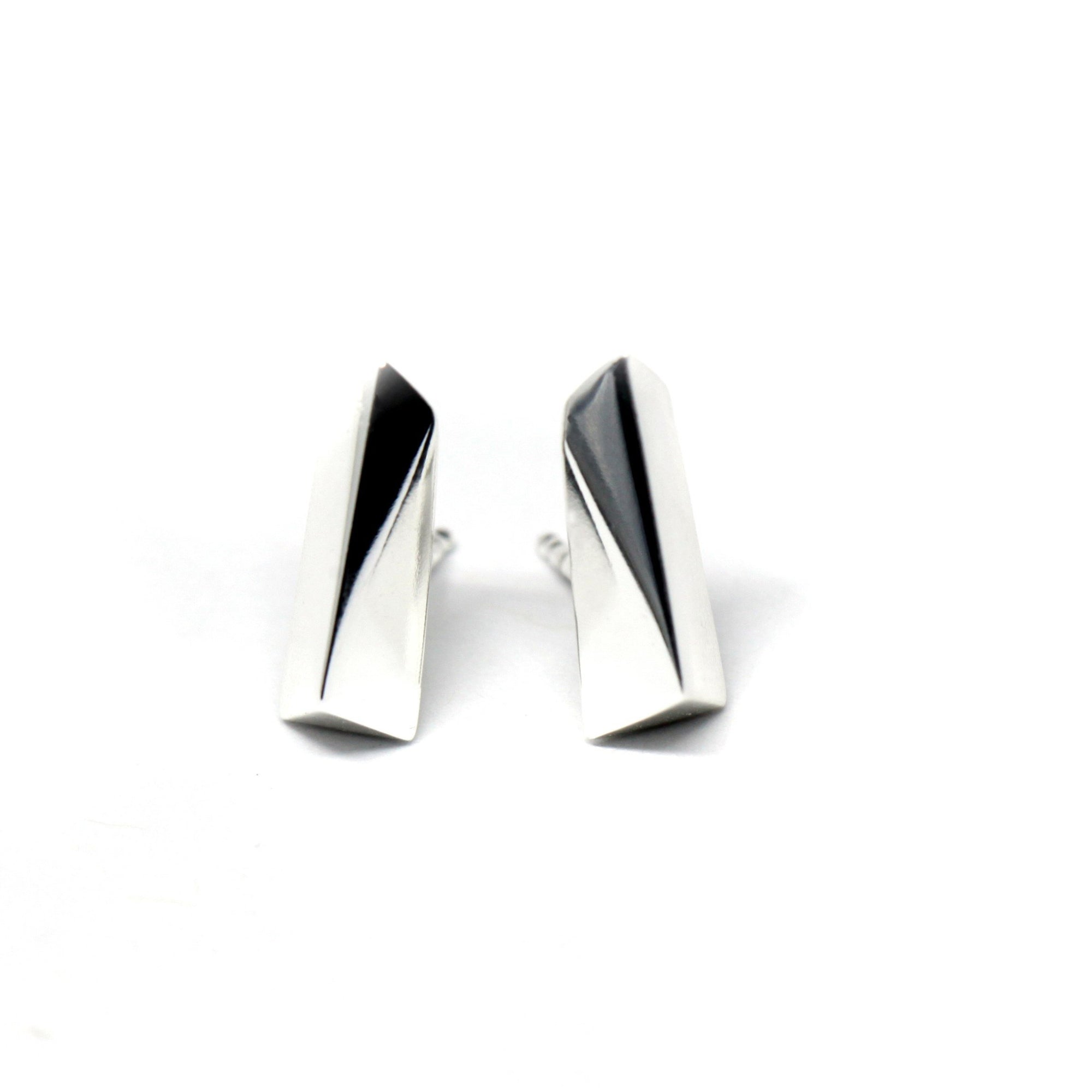 White Gold Pike Earrings on white background – Modern and edgy solid white gold earrings, designed by Bena Jewelry in Montreal.