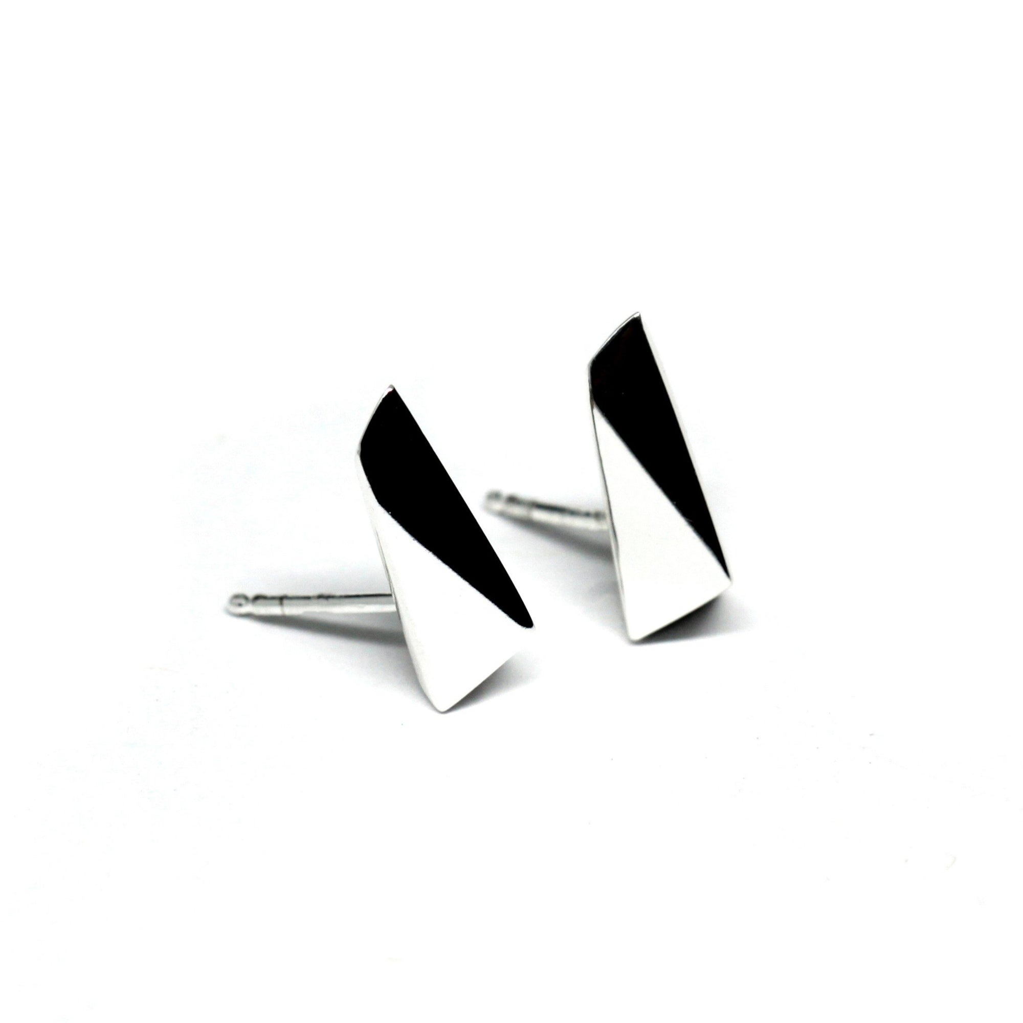 Close-up of White Gold Pike Earrings – A signature design featuring bold, clean lines in high-polish white gold.