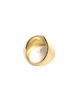 Angled shot of gold ring – A bold, structured ring with a smooth, high-polish gold surface, perfect for those who love modern fine jewelry.