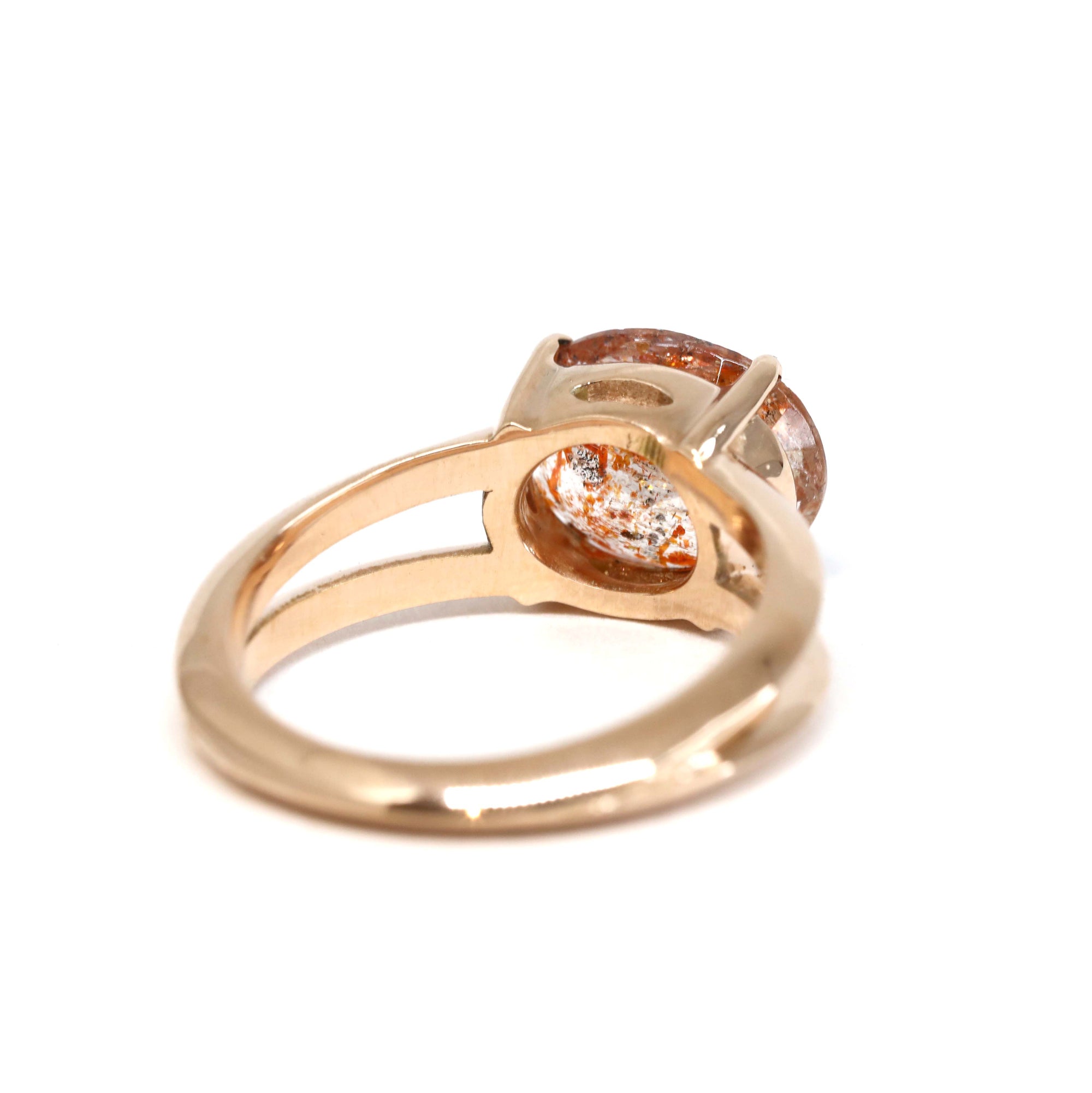 Back view of a rose gold sunstone ring, elegant and modern designer piece from Canada.