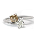 Double Cushion Diamond Ring on white background – A refined Toi et Moi engagement ring featuring white and brown cushion-cut diamonds in white gold. Handmade by Bena Jewelry in Montreal.