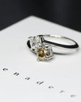 Top-down view of double diamond ring – Cushion-cut diamonds set in white gold for a sophisticated and meaningful design.