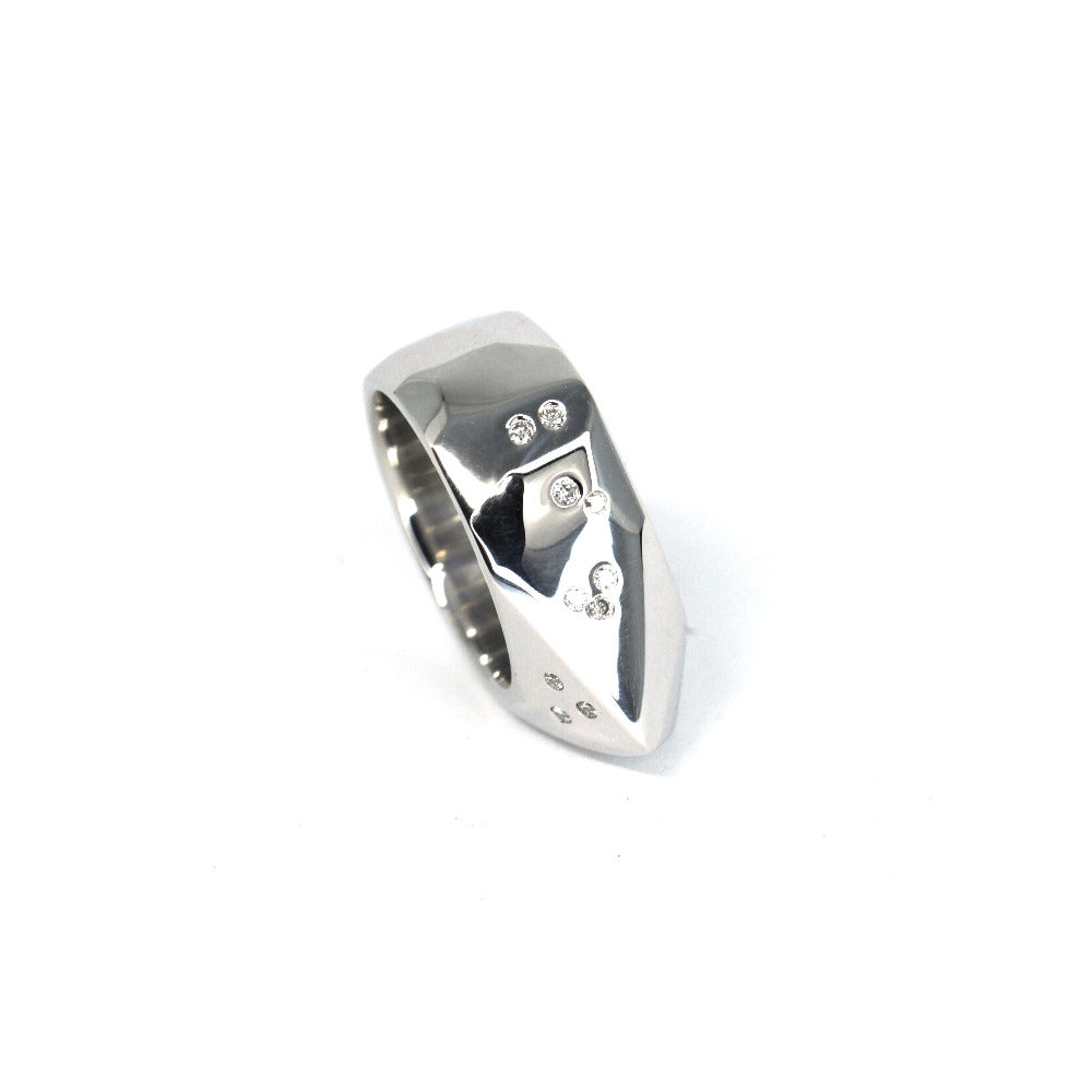 Angled shot of Alp ring – Edgy and minimalist, this handcrafted ring is a standout in contemporary jewelry.