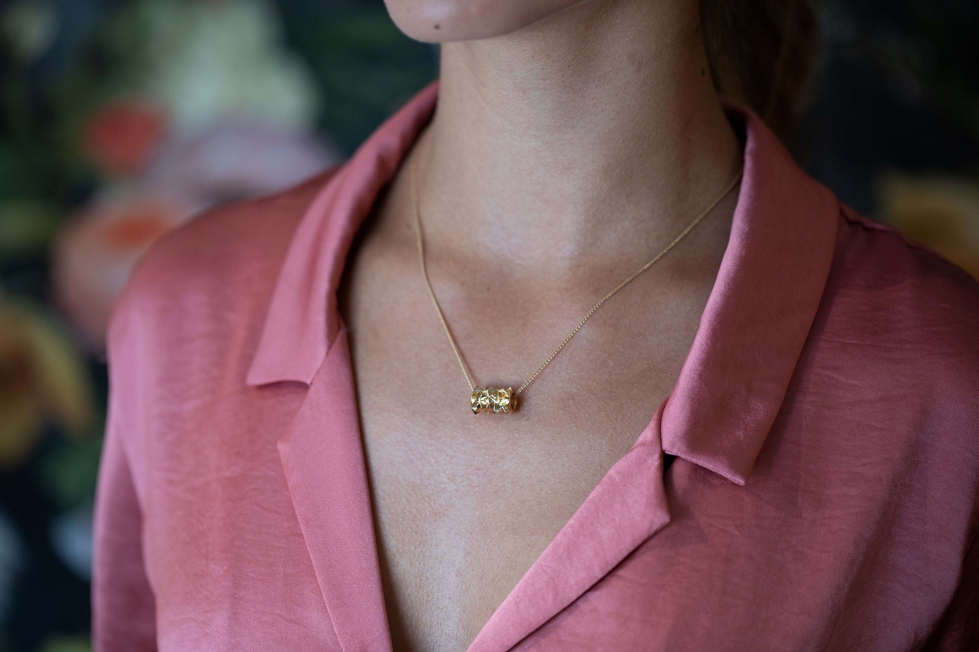 girl wearing vermiel gold edgy pendant made by bena jewelry designer montreal