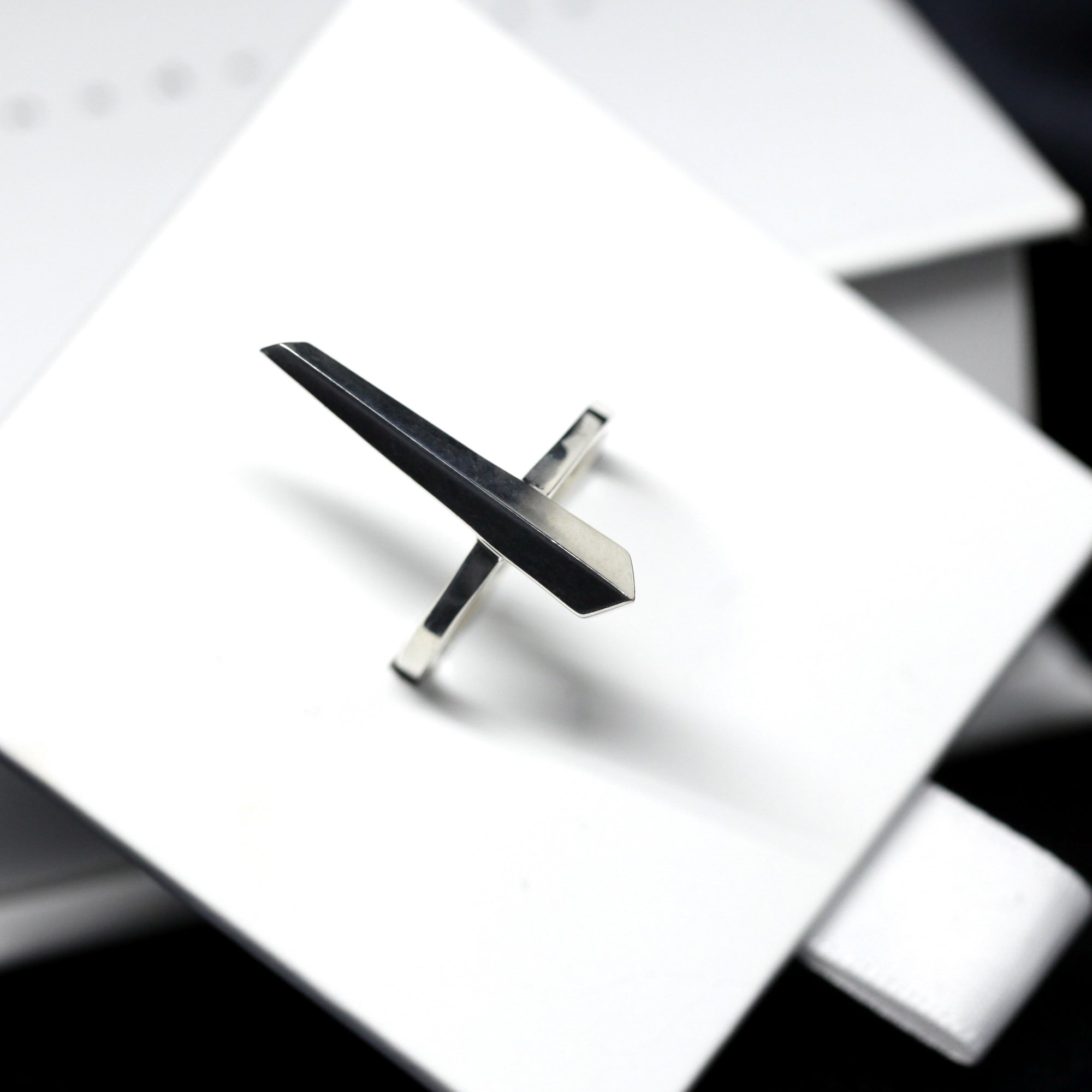 Peak Ring in White Gold on white background – A sculptural and modern white gold ring with a bold, edgy aesthetic. Handmade in Montreal by Bena Jewelry.