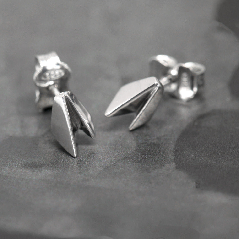 Edges Gold Studs in white gold by Bena Jewelry, showcasing a sleek geometric design, displayed on a dark background unisex fine jewelry made in Montreal
