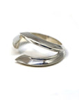 Fang Ring in White Gold on white background – An edgy unisex ring in solid white gold, featuring a sharp and modern open-ended design. Handmade in Montreal.