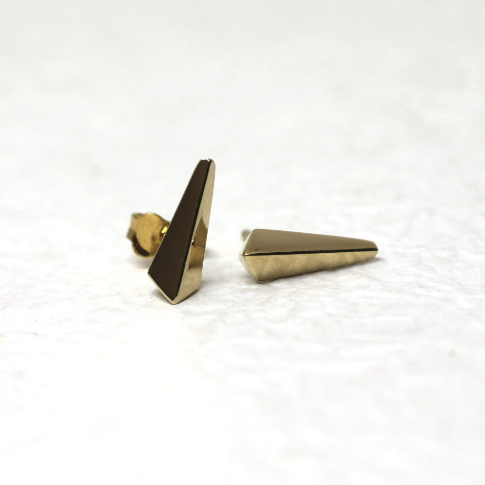 Unisex Blade studs by Bena Jewelry in polished yellow and white gold. Sleek modern design with an edgy flair, part of the designer's signature Edgy Collection, handmade in Canada.