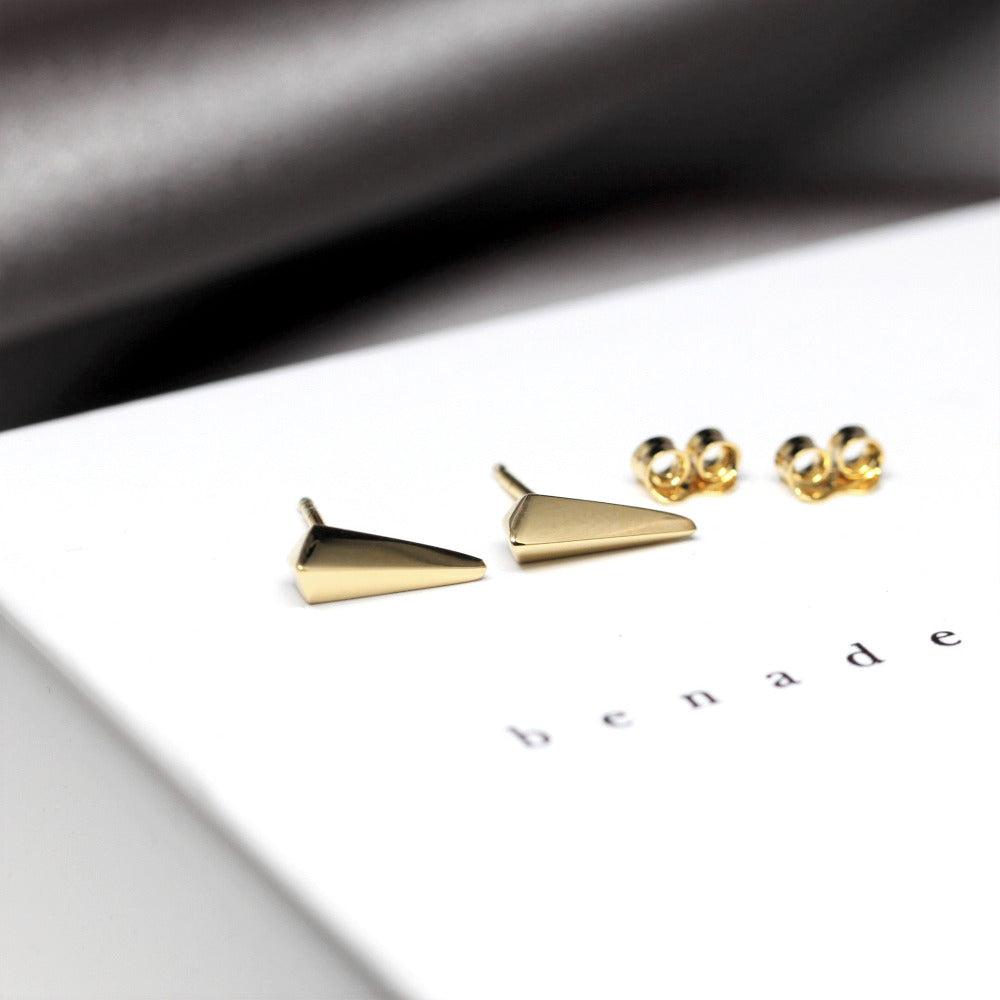 Minimalist Blade studs by Bena Jewelry, crafted from high-quality yellow and white gold. Perfect for lovers of bold, modern designs. Made in Canada.