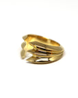 Close-up of Crush Ring – A sculptural gold ring with a modern, architectural silhouette for a striking look.