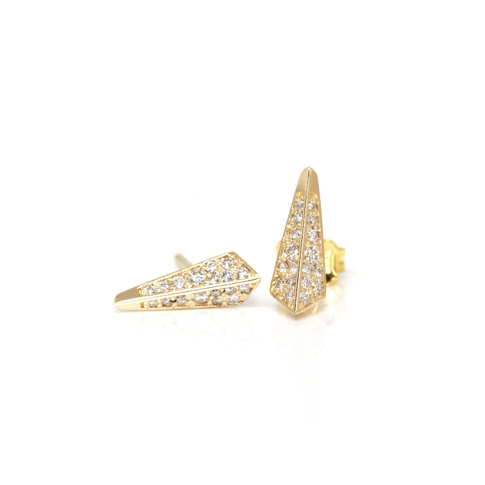 Product photography of gender fluid and modern bold gold earring diamond studs designed in Montreal by local brand Bena Jewelry.
