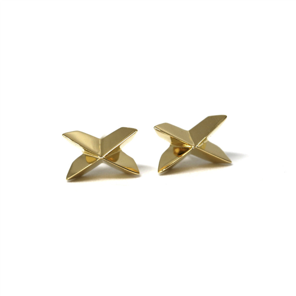 Bold yellow gold cross-shaped earrings crafted by Bena Jewelry, photographed on a white background, custom-made fine jewelry from Canada.