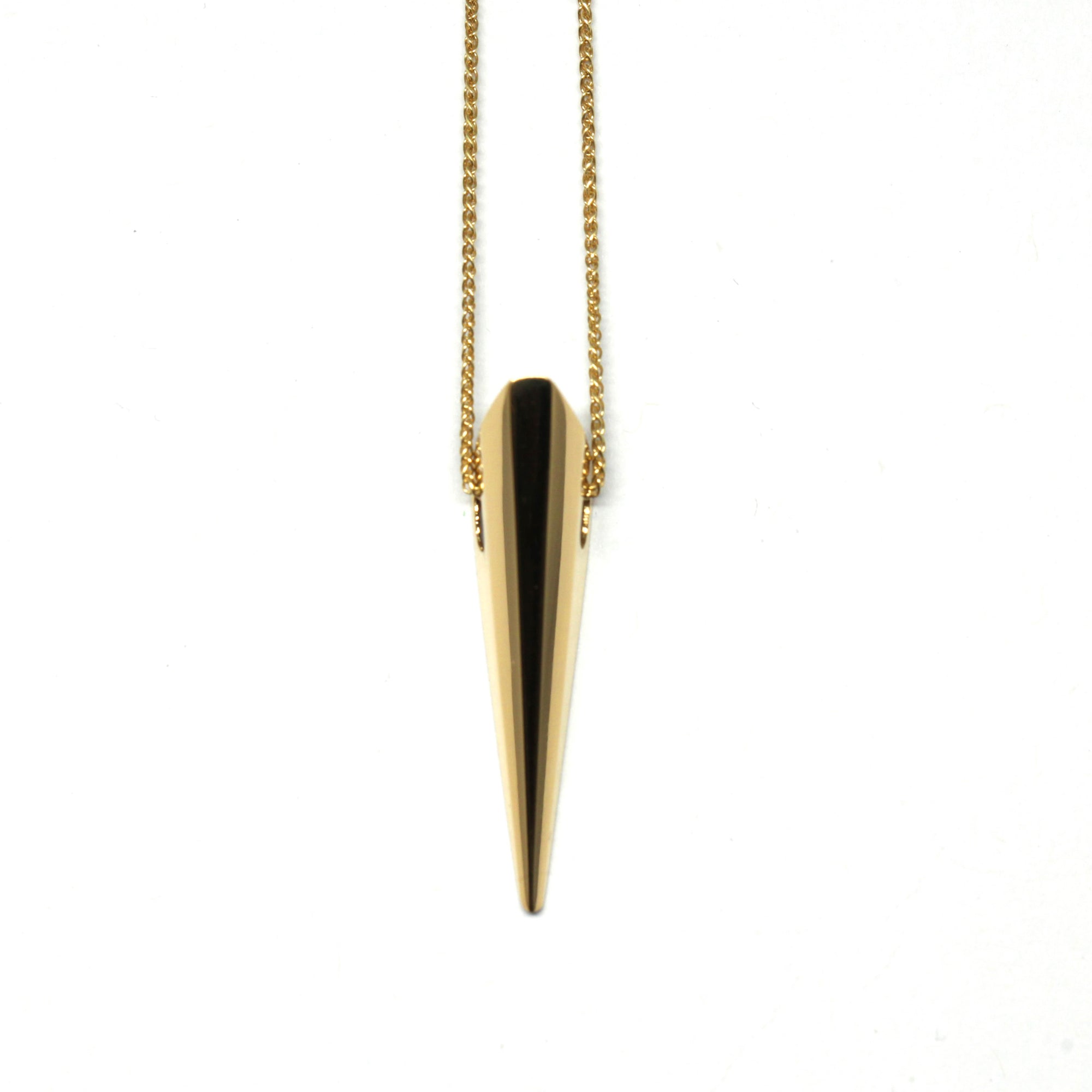 Sleek Yellow Gold Pike Pendant on white background – A bold, minimalist pendant with sharp geometric lines, designed by Bena Jewelry in Montreal.
