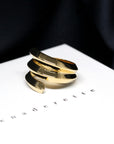 Side view of Embrace Ring in Yellow Gold – A contemporary and modern unisex ring with an open, sculptural design.