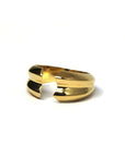 Close-up of Frill Ring in Yellow Gold – A sleek and structured gold ring with a smooth, high-polish finish.