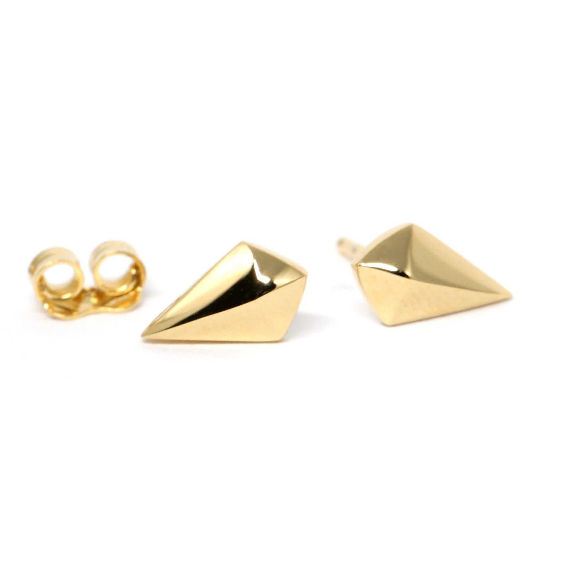 Mini Spade Gold Stud Earrings on white background – Sleek and minimalist gold stud earrings, designed for a modern and unisex look. Handmade by Bena Jewelry in Montreal.