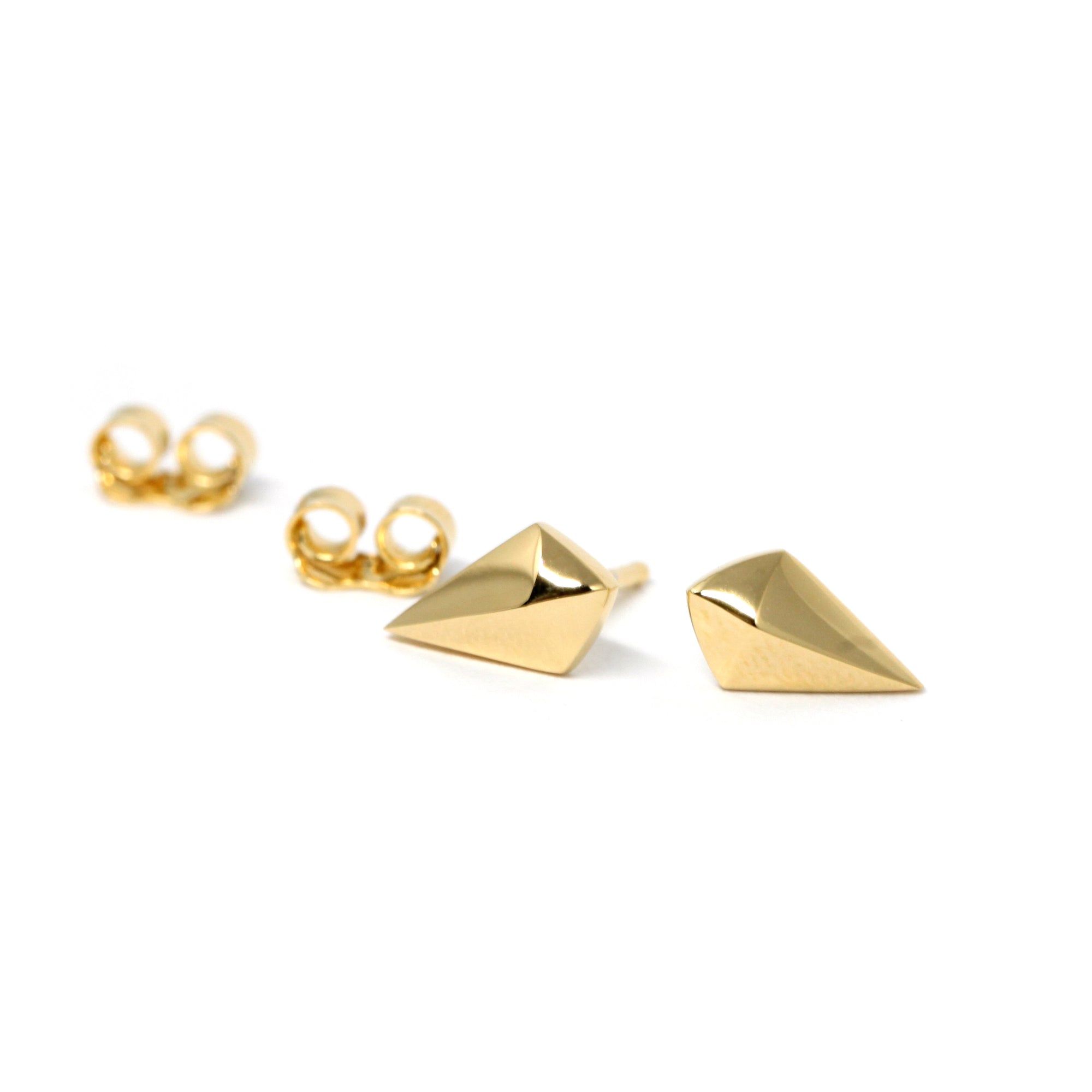 Side view of gold stud earrings – Refined and modern, these earrings are crafted in yellow and white gold for everyday wear.