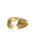 Side view of Tidal Ring in Yellow Gold – A contemporary fine jewelry piece with an organic and dynamic shape.