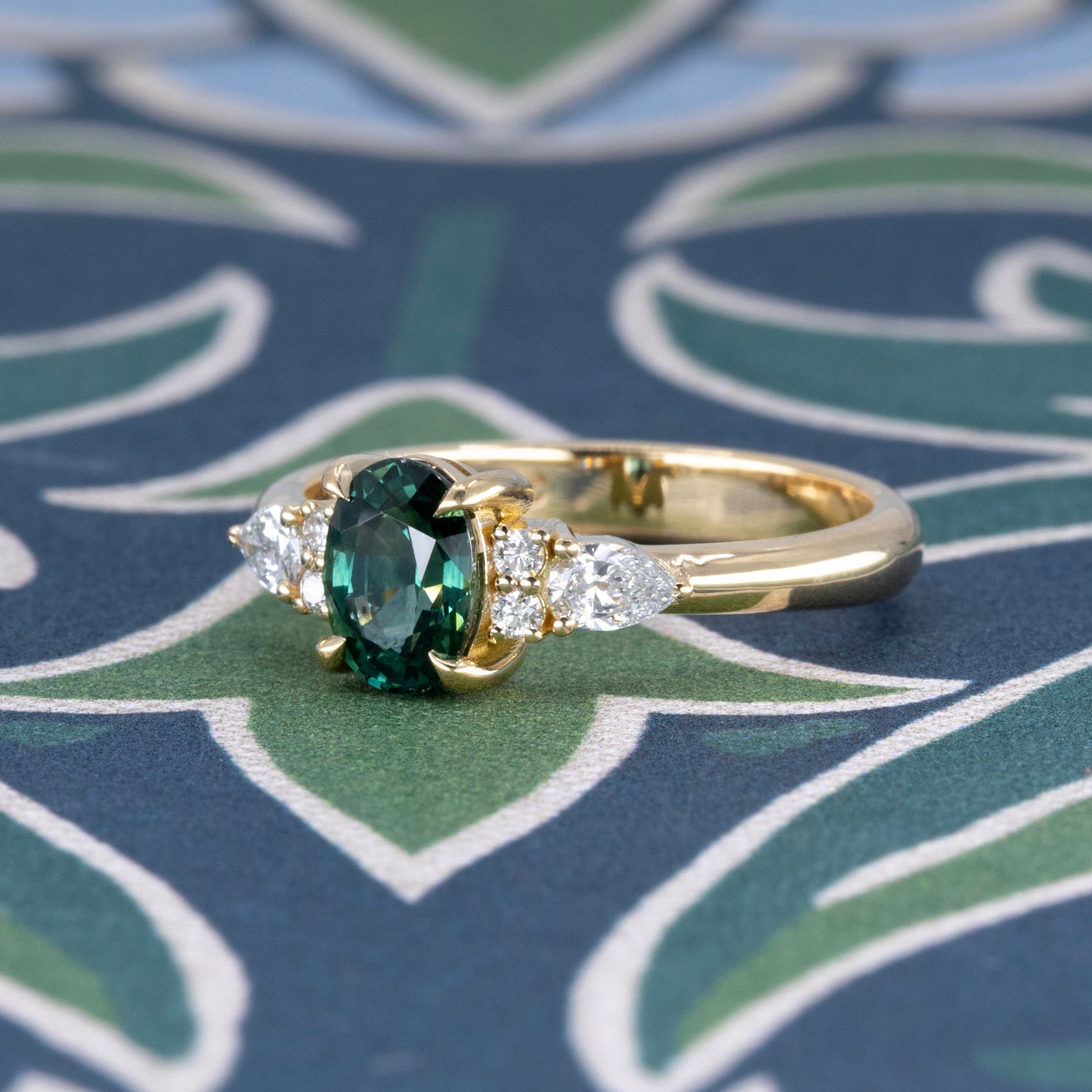 OVAL SHAPE TEAL SAPPHIRE &amp; SIDE DIAMOND | Yellow Gold