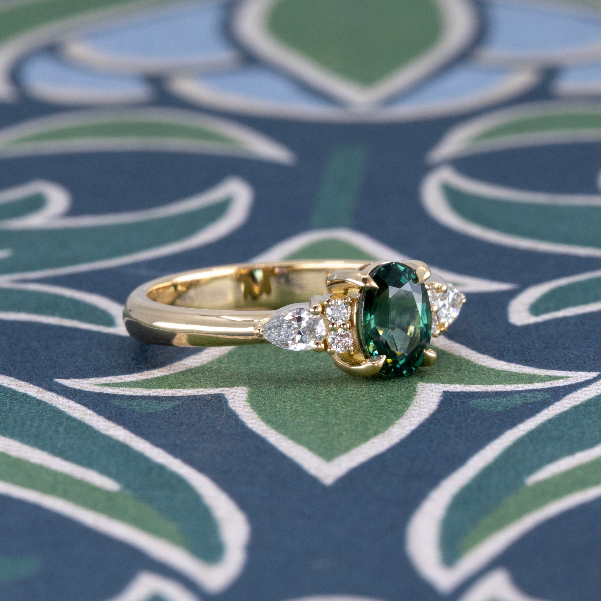 OVAL SHAPE TEAL SAPPHIRE &amp; SIDE DIAMOND | Yellow Gold