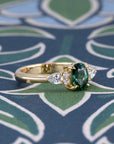 OVAL SHAPE TEAL SAPPHIRE & SIDE DIAMOND | Yellow Gold