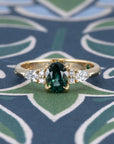 OVAL SHAPE TEAL SAPPHIRE & SIDE DIAMOND | Yellow Gold