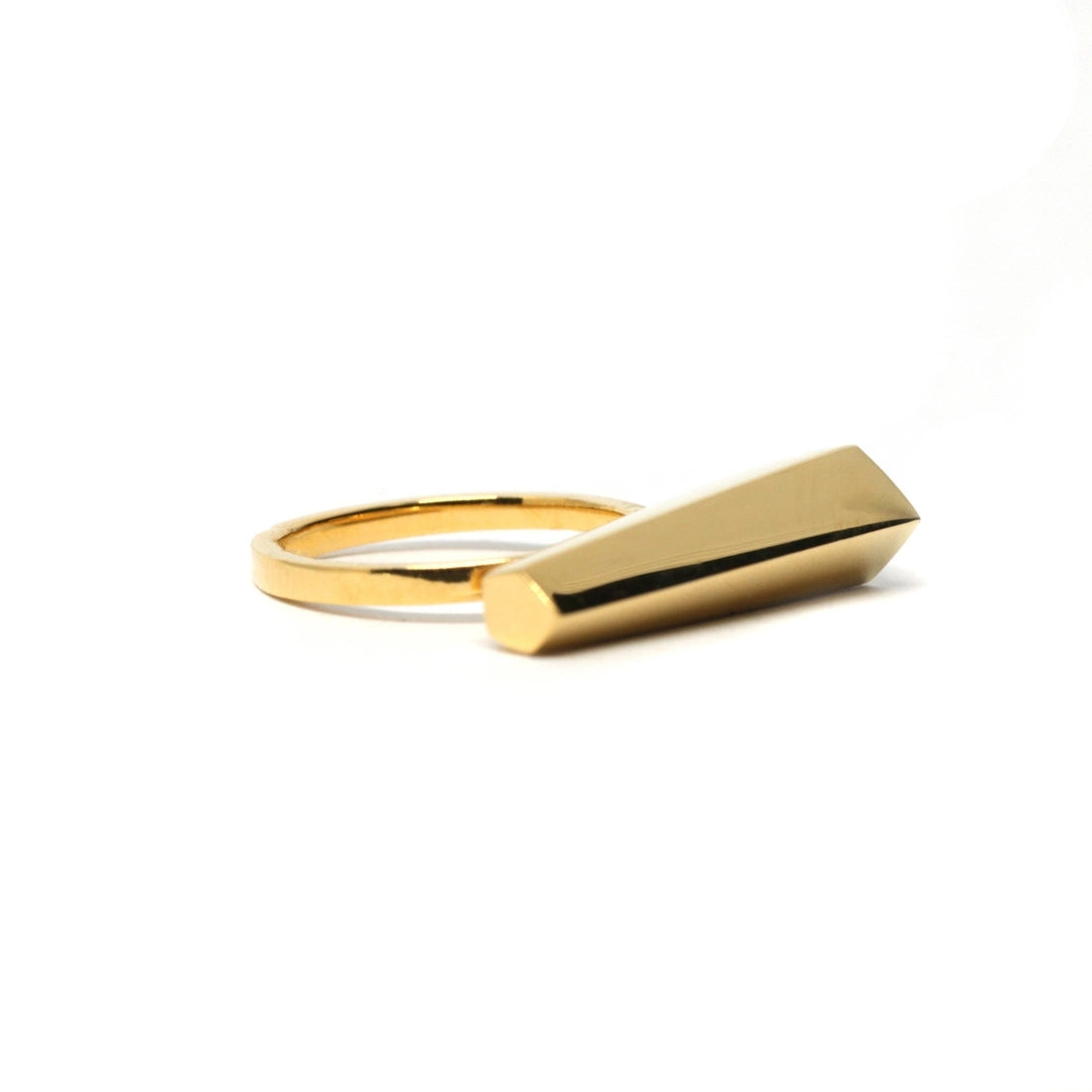 The Sturdy yellow gold ring by Canadian jewelry designer Bena Jewelry, photographed close-up against a white background. Modern, predominantly handcrafted jewelry that empowers.