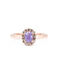 Opalescent purple sapphire ring by Bena Jewelry featuring a natural champagne diamond halo and rose gold setting. Contemporary Canadian fine jewelry handmade in Montreal.