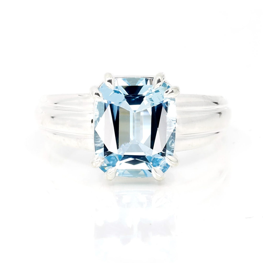 aquamarine cushion shape silver ring custom made by bena jewelry in montreal on white background