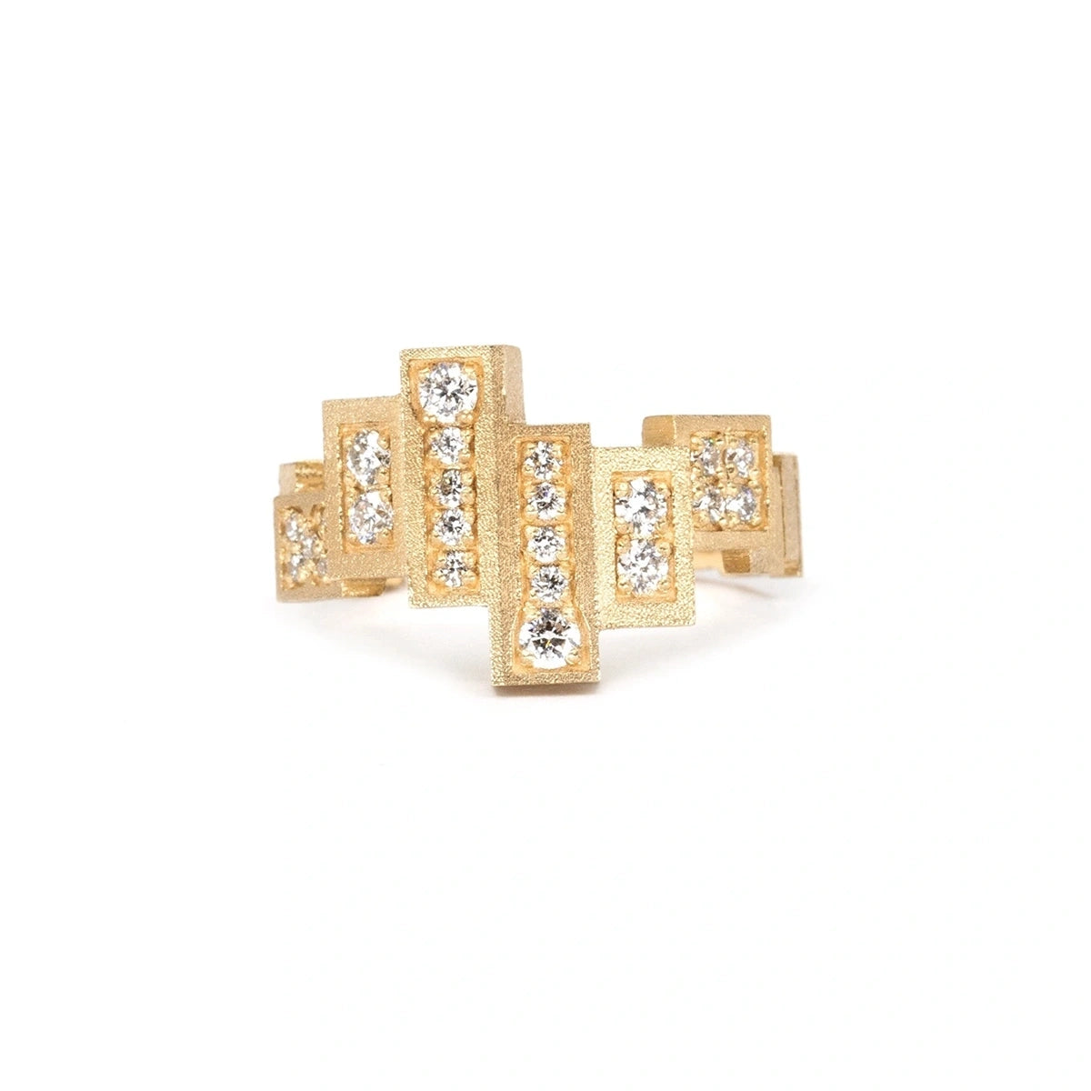 Unique, highly original ring in yellow gold with a rough finish made of several gold rectangles assembled side by side in a staggered fashion. Several of these blocks are set with extra-brilliant diamonds. The result is a jewel with a futuristic, geometric look. This fine piece of jewelry was designed and created in Montreal, Canada, by independent brand Bena Jewelry. 