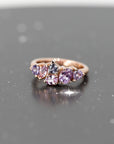 purple and pink sapphire avalanche rose gold designer bena jewelry ring made in montreal on dark background