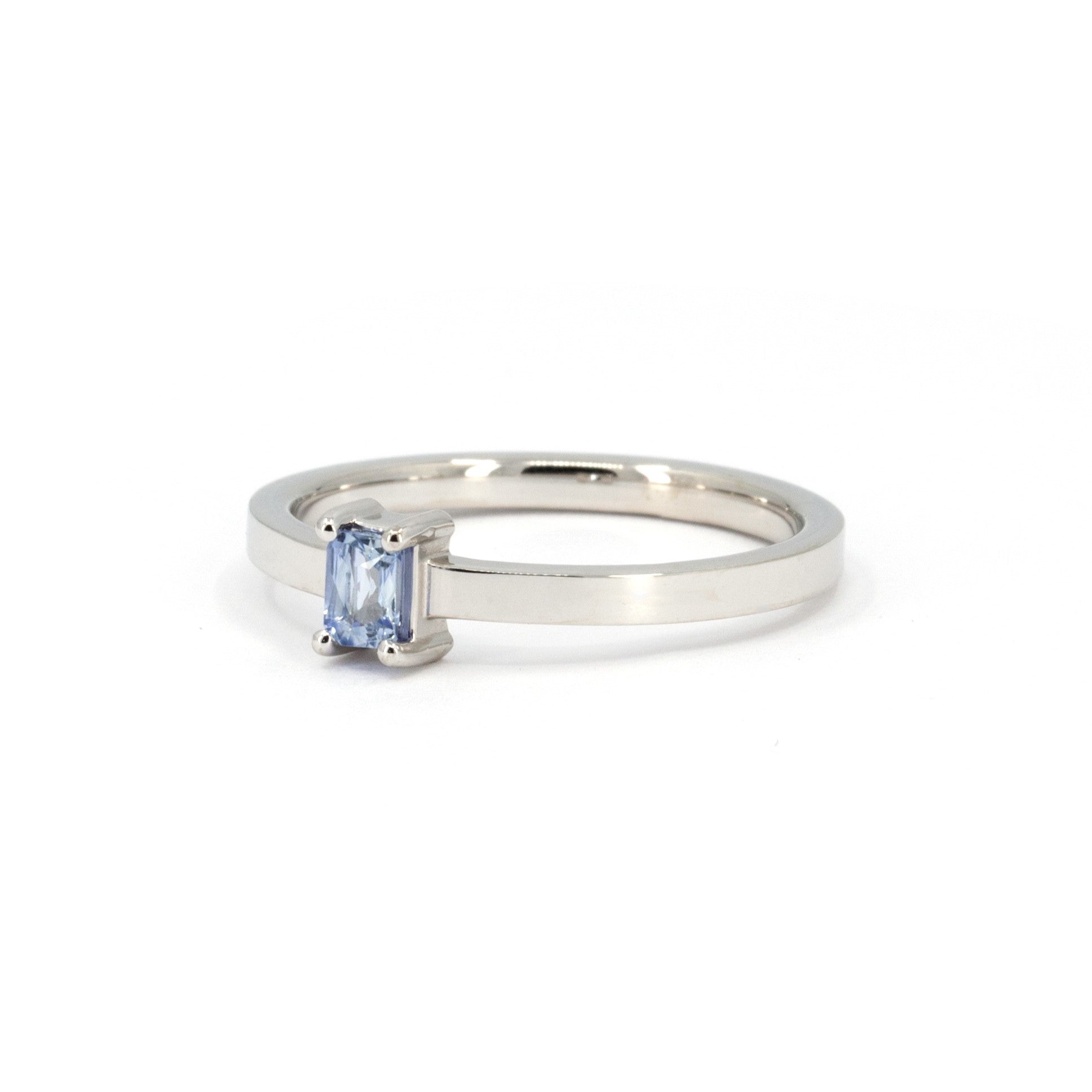 Close-up of the sapphire baguette ring by Bena Jewelry, showcasing the precision setting and elegant minimalist design, made in Montreal.