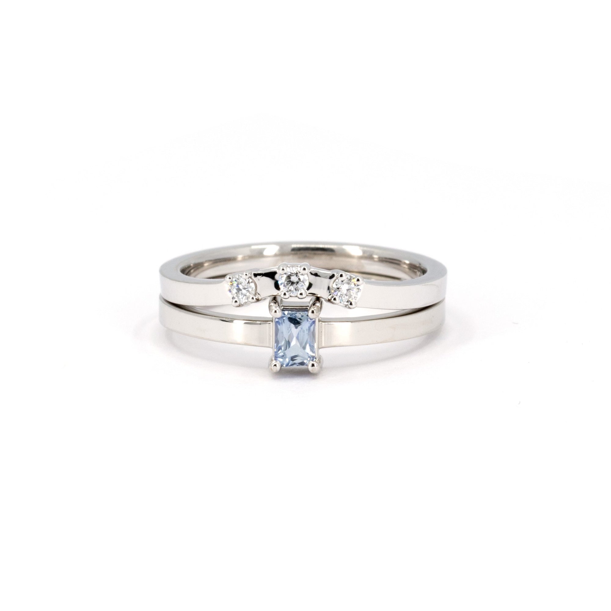 Boxy Minimalist Set by Bena Jewelry, featuring a sapphire baguette ring and curved diamond band, handcrafted in Montreal.