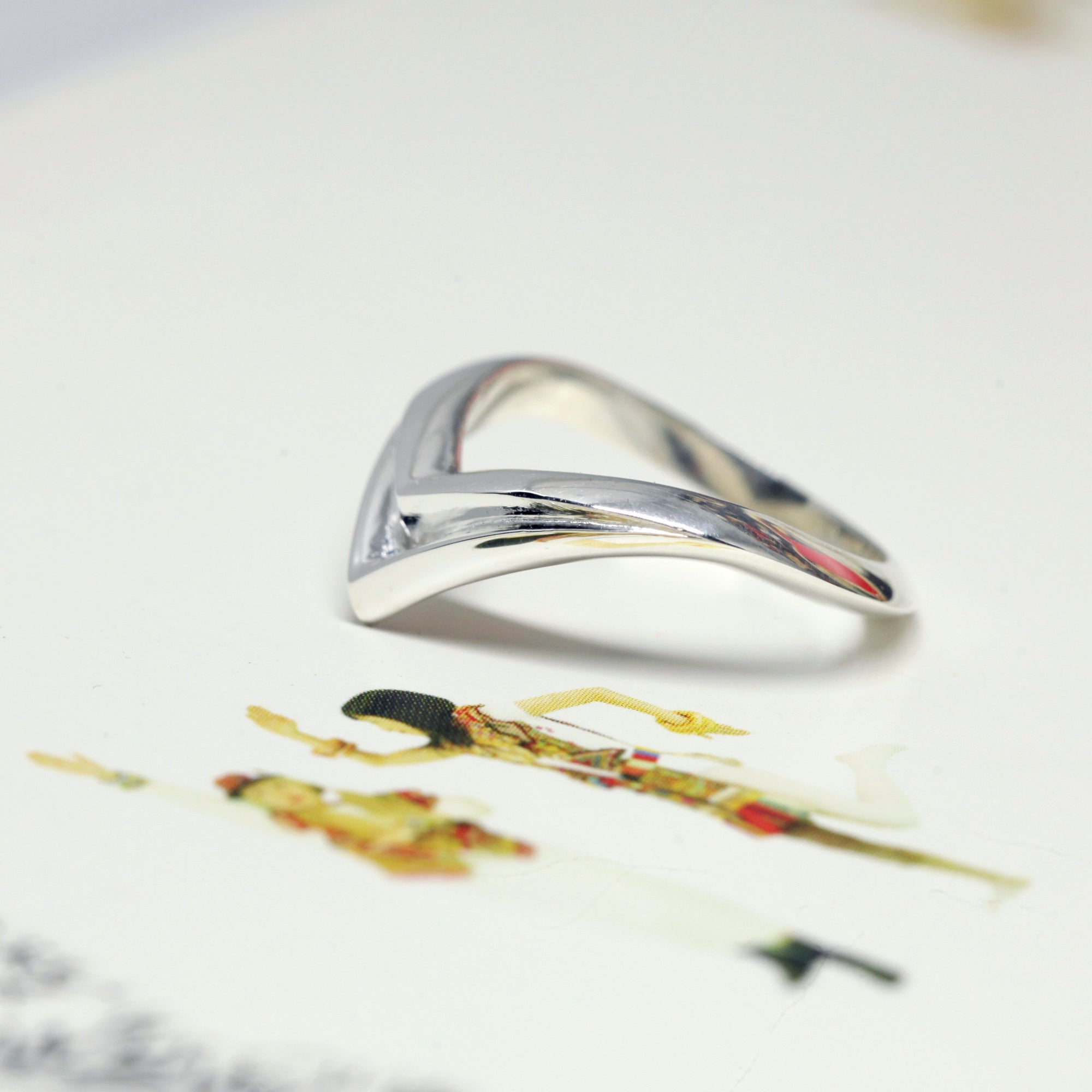 Close-up of Adorn White Gold Ring – A bold and modern statement ring with sleek lines and a sculptural silhouette, handmade by Bena Jewelry.
