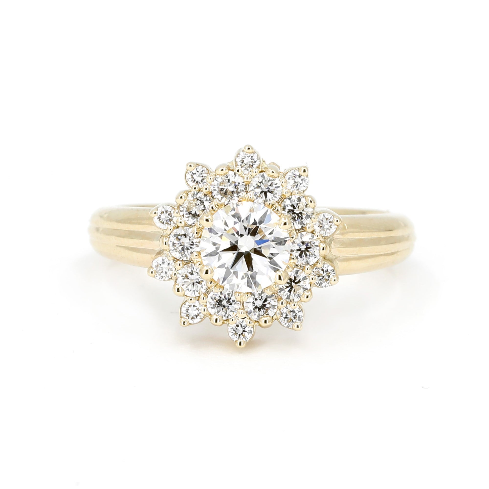 Soleil Ring with a round diamond and double halo, set in yellow gold. Handmade by Bena Jewelry in Montreal.