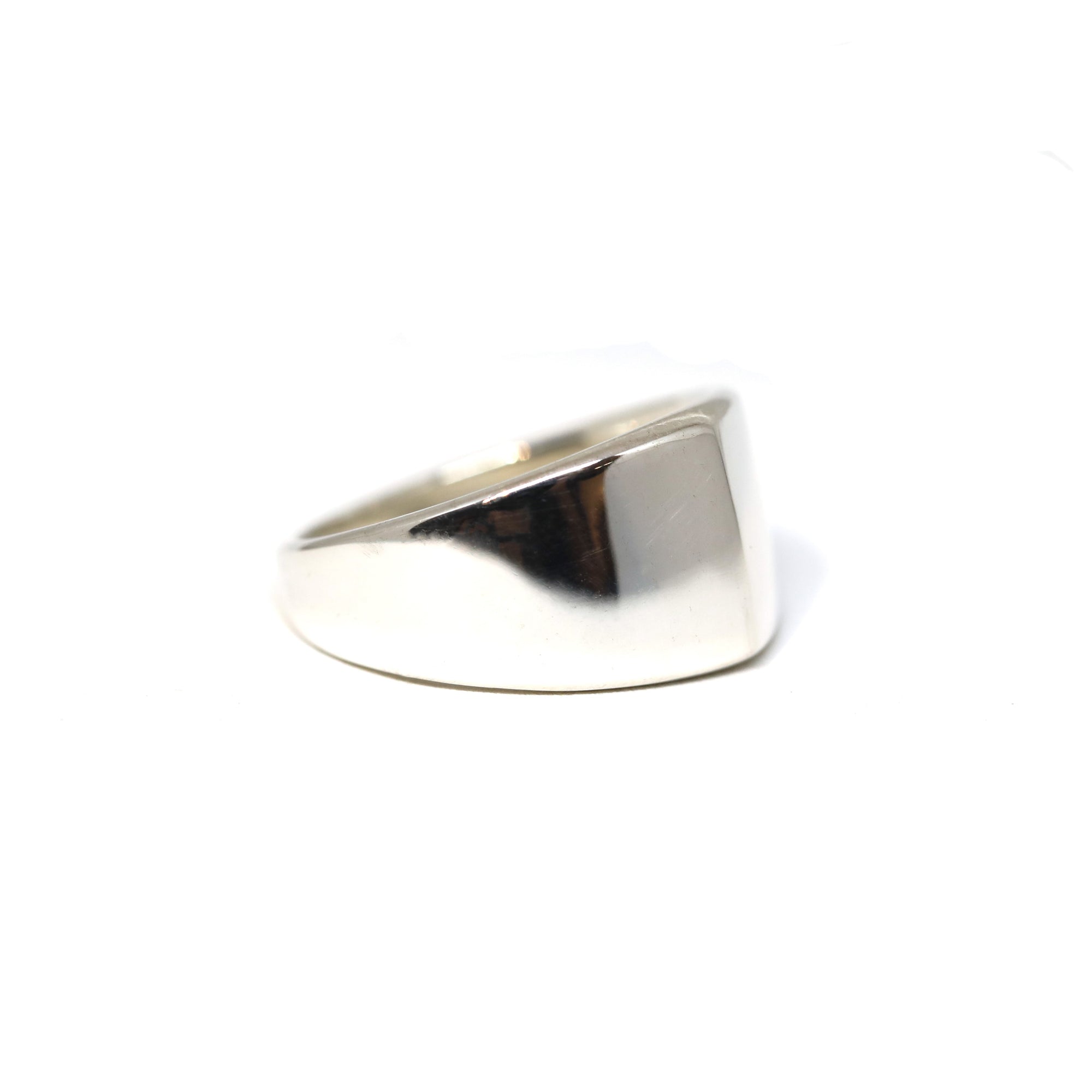 Side view of Lump Ring in White Gold – A modern and edgy designer ring with smooth lines and a sculptural shape.
