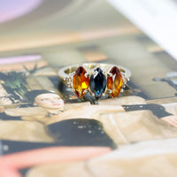 bena jewelry designer marquise sapphire and citrine edgy bridal engagement ring made in montreal trilogy on multi color background