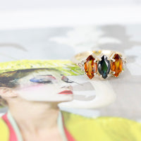 custom made colored gemstone bena jewelry designer gold ring custom made in montreal on multi color background