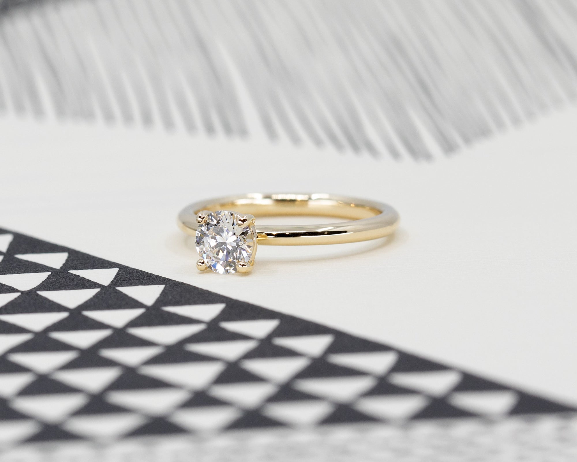 Side view of a custom made engagement ring diamond ring in Monteal, made by Bena Jewelry, bridal jewelry designer.
